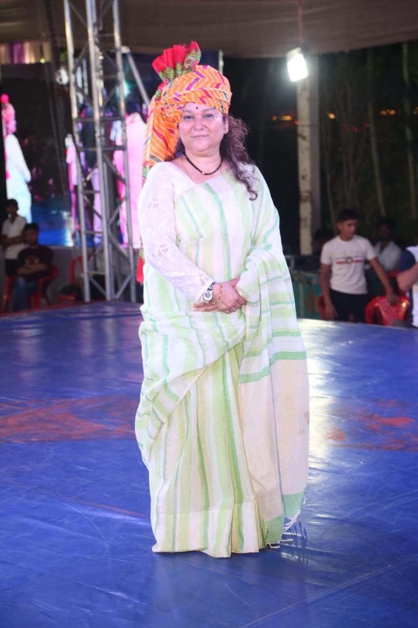 A girl performing a traditional dance on stage