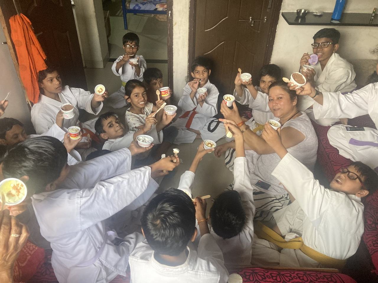 Karate team celebrating together