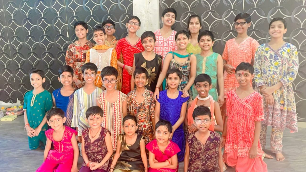 Group of girls in colourful festive dresses