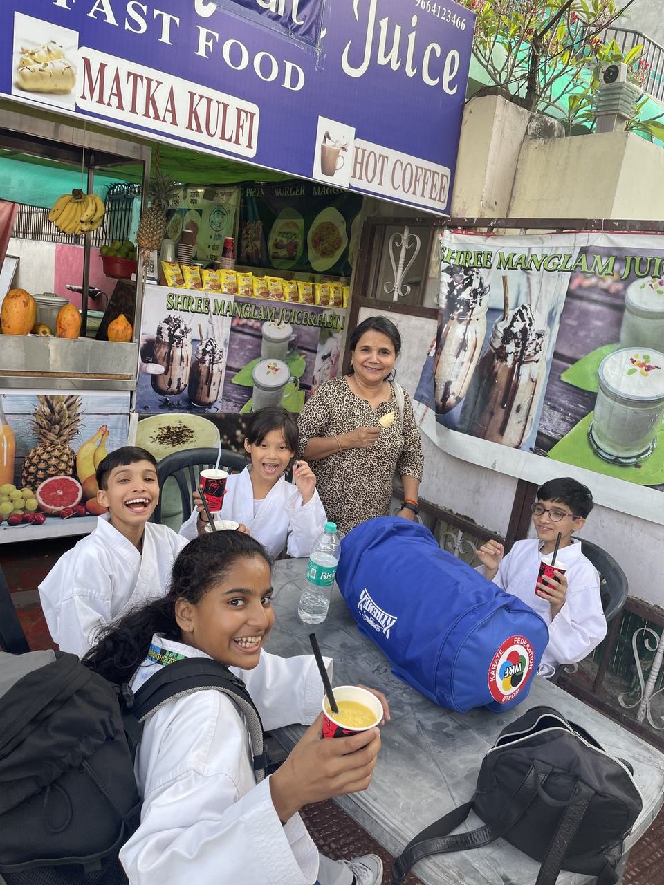 Children taking a snack break during an outing