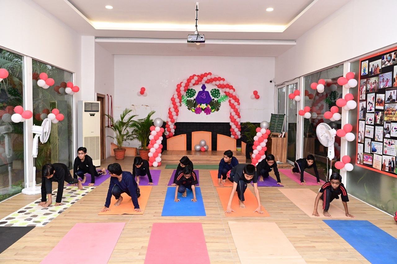 Children practising self-defense in the training hall