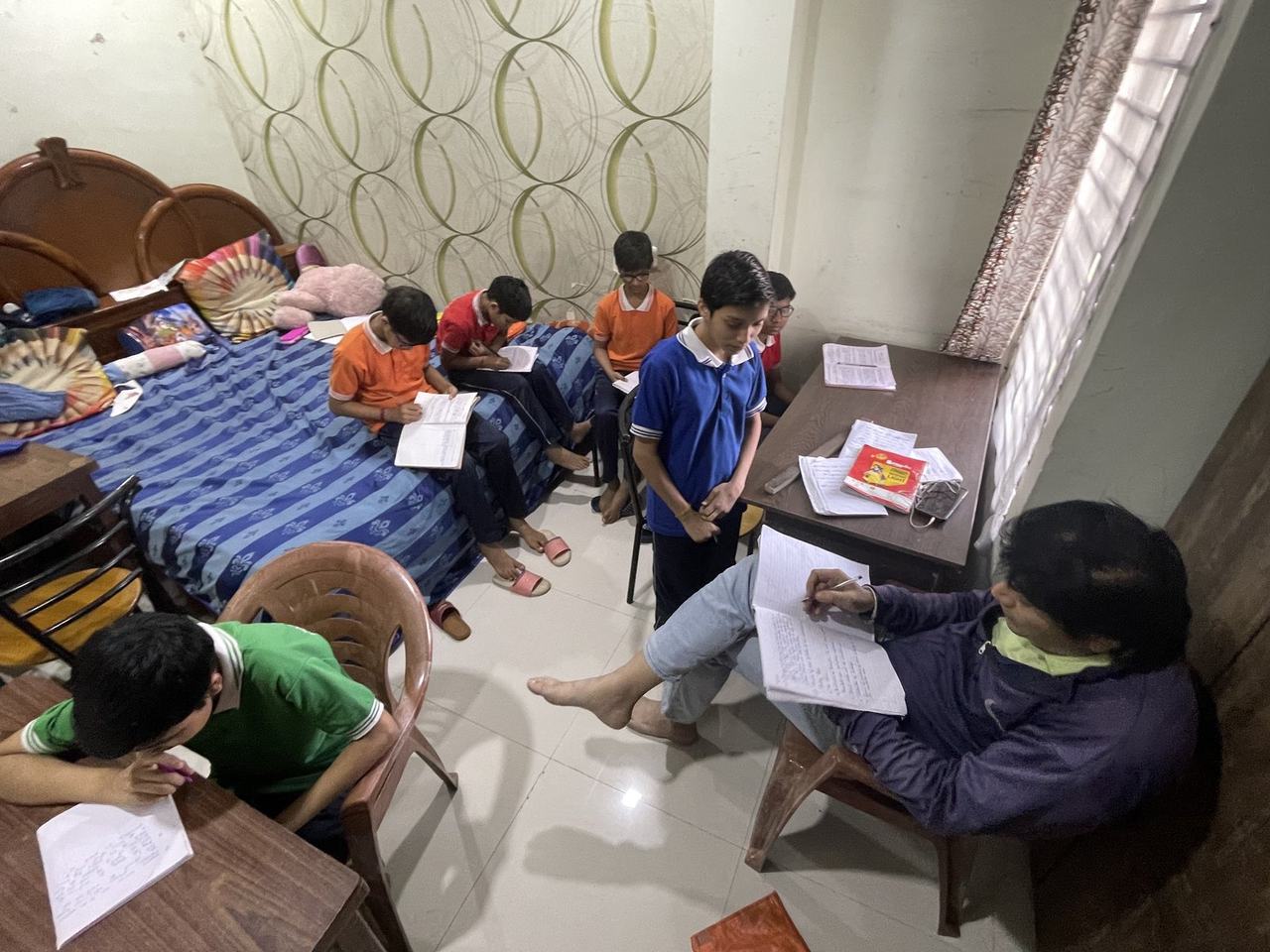 Children studying together at a table