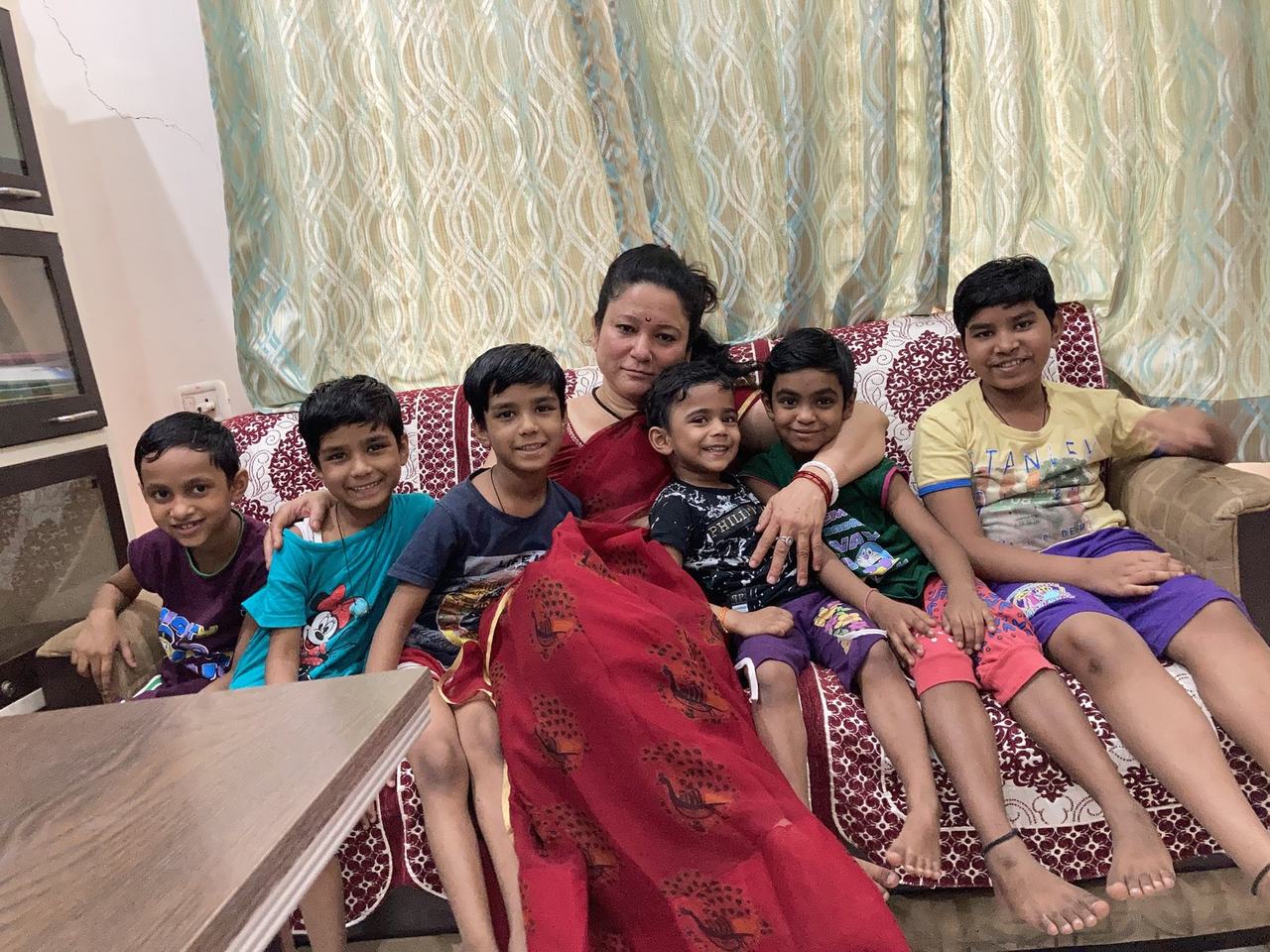 Founder Sumitra Mishra with children at home