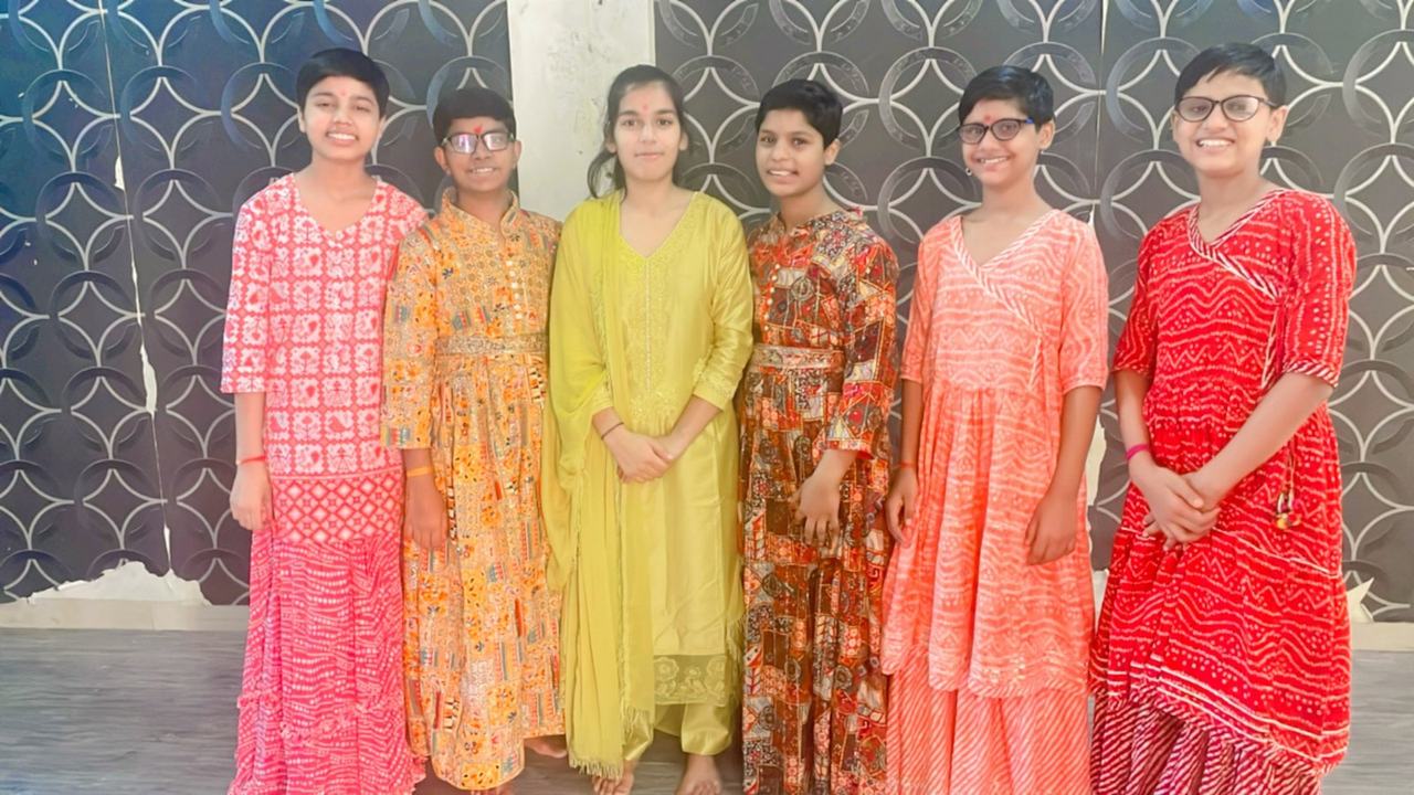 Family group in coordinated festive outfits