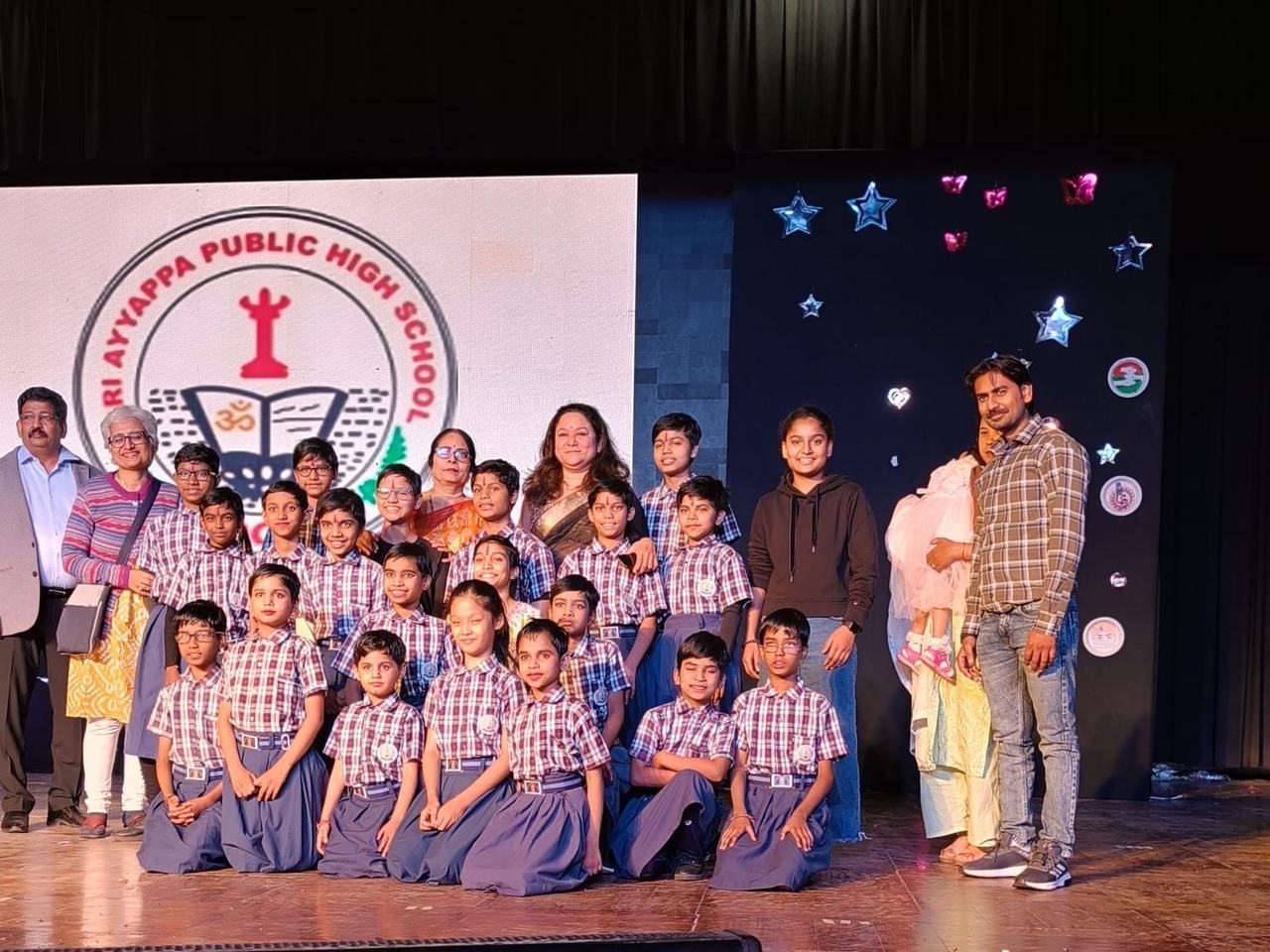 Children on stage at a school event