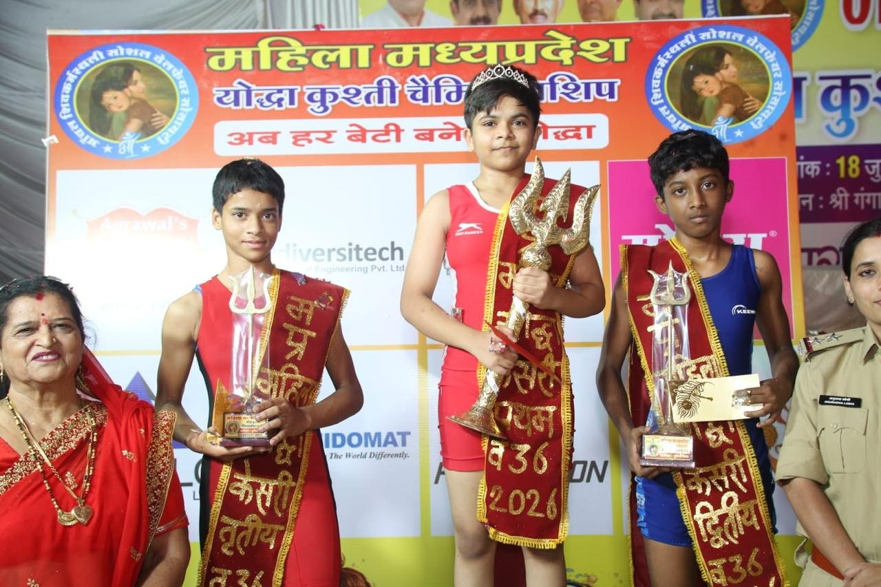 Winners on stage at the Mahila Madhya Pradesh Yodha Kushti Championship 2026