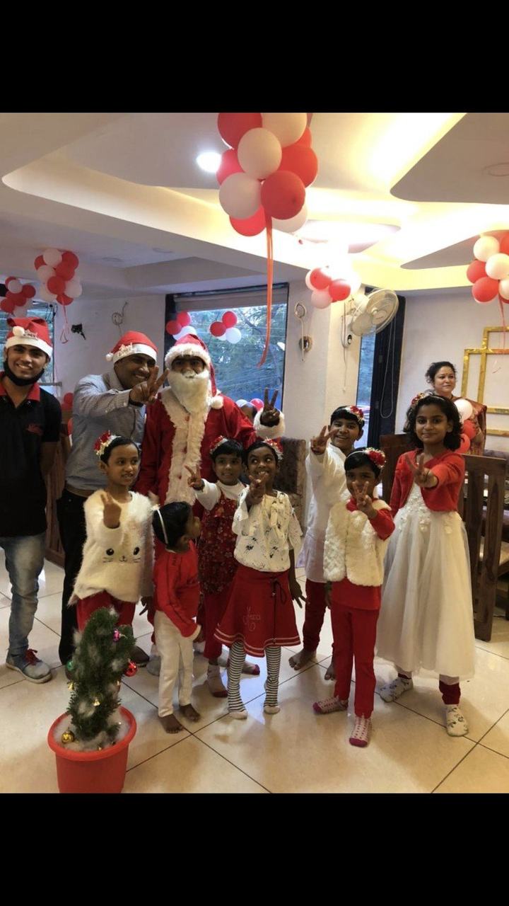 Children celebrating Christmas with Santa